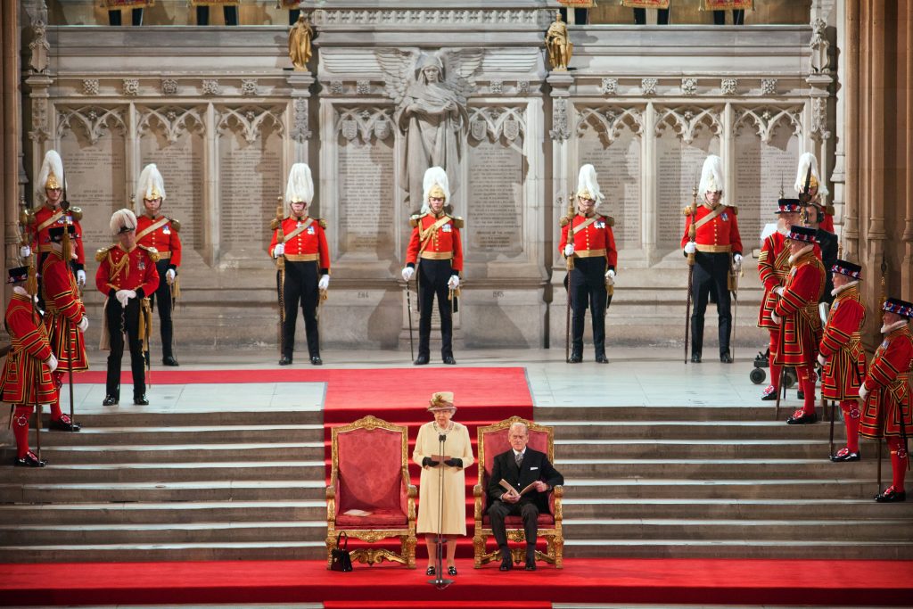 Britain's Queen Elizabeth addresses both Houses of Parliament, next to her husband Prince Philip at Westminster Hall in London March 20, 2012. REUTERS/Jack Hill/POOL