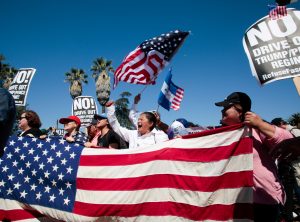 Protesters gather at McArthur Park for the May Day protest march in Los Angeles, California, U.S. May 1, 2017. REUTERS/Kyle Grillot - RTS14OLW