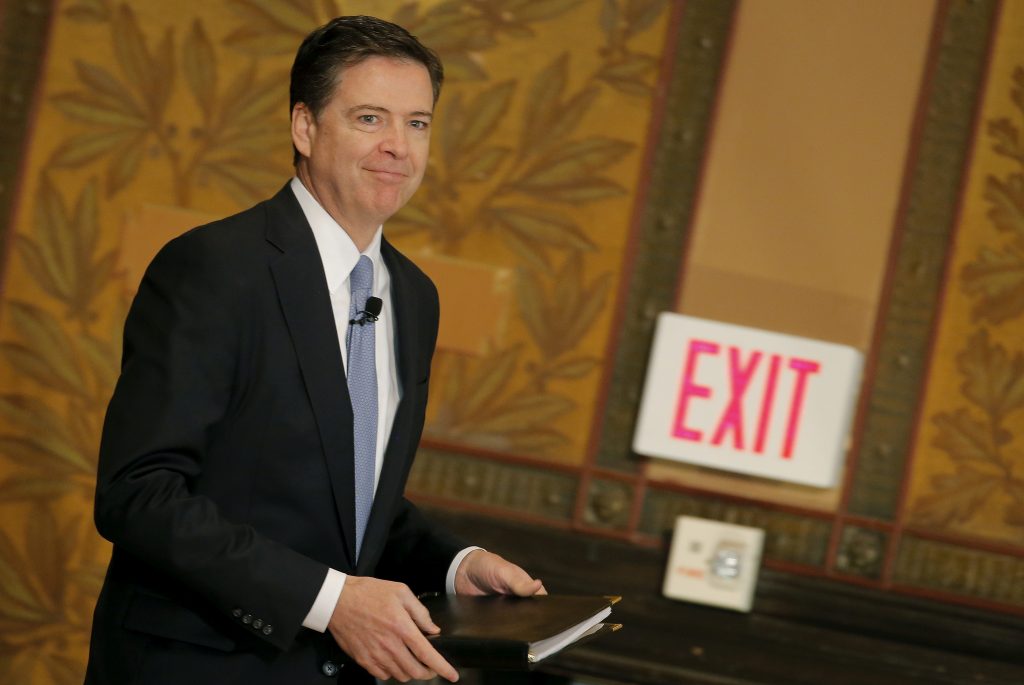 FILE PHOTO: FBI Director James Comey arrives to deliver a speech at the Master of Science in Foreign Service CyberProject's sixth annual conference at Georgetown University in Washington D.C., U.S. April 26, 2016. REUTERS/Carlos Barria/File Photo - RTS1624Q