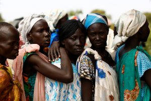 Women wait in line during a UNICEF supported mobile health clinic in the village of Rubkuai, Unity State, South Sudan, February 16, 2017. Picture taken February 16, 2017. REUTERS/Siegfried Modola - RTSZG0U