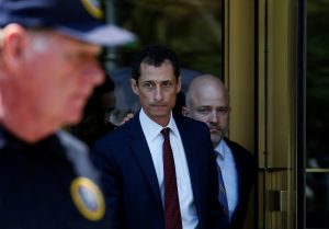 Former U.S. Congressman Anthony Weiner exits U.S. Federal Court with attorney Arlo Devlin-Brown (back, R), after pleading guilty to one count of sending obscene messages to a minor, ending an investigation into a "sexting" scandal that played a role in last year's U.S. presidential election. Photo taken May 19, 2017. Photo by Reuters