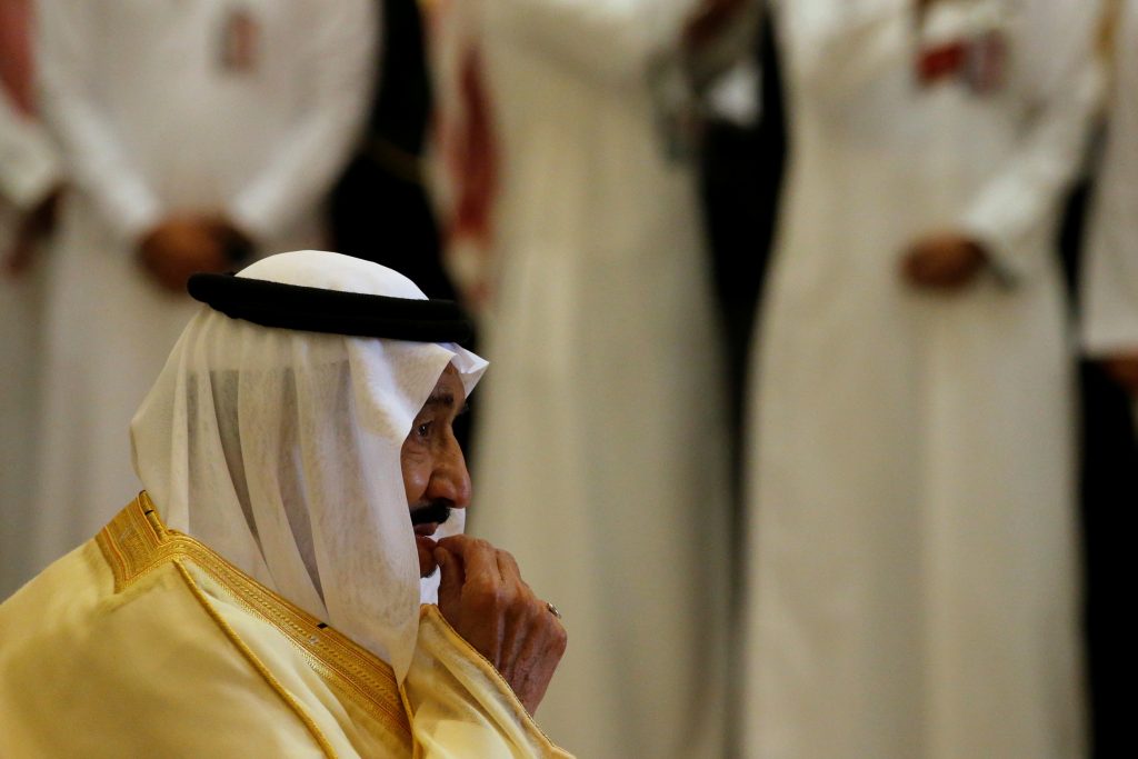 Saudi Arabia's King Salman waits to greet Trump as he arrives to attend summit of GCC leaders in Riyadh