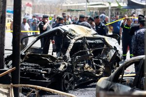 A wreckage of a car is seen at the site of car bomb attack near a government office in Karkh district in Baghdad, Iraq May 30, 2017. REUTERS/Khalid al-Mousily - RTX386SI