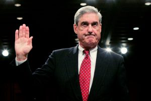 FILE PHOTO: FBI Director Robert Mueller is sworn in to testify before the Senate Judiciary Committee during a hearing on "Oversight of the Federal Bureau of Investigation (FBI)," on Capitol Hill in Washington September 17, 2008. REUTERS/Molly Riley/File Photo TPX IMAGES OF THE DAY - RTX36AYB