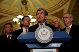 Sen. Roy Blunt (R-MO), accompanied by Sen. Cory Gardner (R-CO), Sen. John Barrasso (R-WY), Sen. John Cornyn (R-TX) and Senate Majority Leader Mitch McConnell, speaks with reporters following the weekly policy luncheons on Capitol Hill in Washington, D.C., U.S., June 6, 2017. REUTERS/Aaron P. Bernstein - RTX39C1B