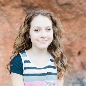 Watch this 7th grader use slam poetry to tell girls: 'You are good enough'