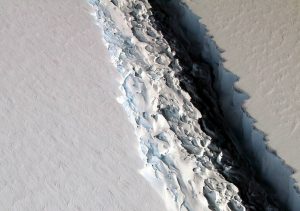An oblique view of a massive rift in the Antarctic Peninsula's Larsen C ice shelf is shown in this November 10, 2016 photo taken by scientists on NASA's IceBridge mission in Antarctica. Photo by John Sonntag/NASA/Handout via REUTERS