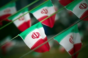 File photo of Iran's national flags by Morteza Nikoubazl/Reuters