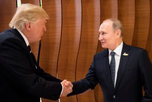 U.S. President Donald Trump and Russia's President Vladimir Putin shake hands during the G20 Summit in Hamburg