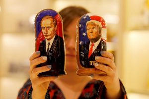MOSCOW, RUSSIA - JANUARY 17: Painted Matryoshka dolls, or known as Russian nesting dolls, bearing the faces of Russian President Vladimir Putin and President-elect Donald Trump are offered in a souvenir shop in Moscow, Russia on January 17, 2017. (Photo by Sefa Karacan/Anadolu Agency/Getty Images)