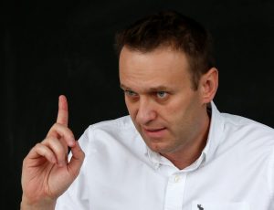Russian opposition leader Alexei Navalny gestures during an interview with Reuters in Moscow