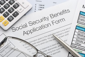 Can I work and still collect my late husband's Social Security benefits?