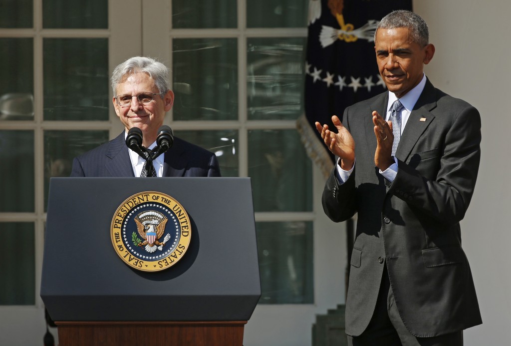 Judge Merrick Garland speaks as President Barack Obama applauds after Obama announced him as his nominee to the U.S. Supreme Court, in the Rose Garden of the White House in Washington, D.C. on March 16. Photo by Kevin Lamarque/Reuters