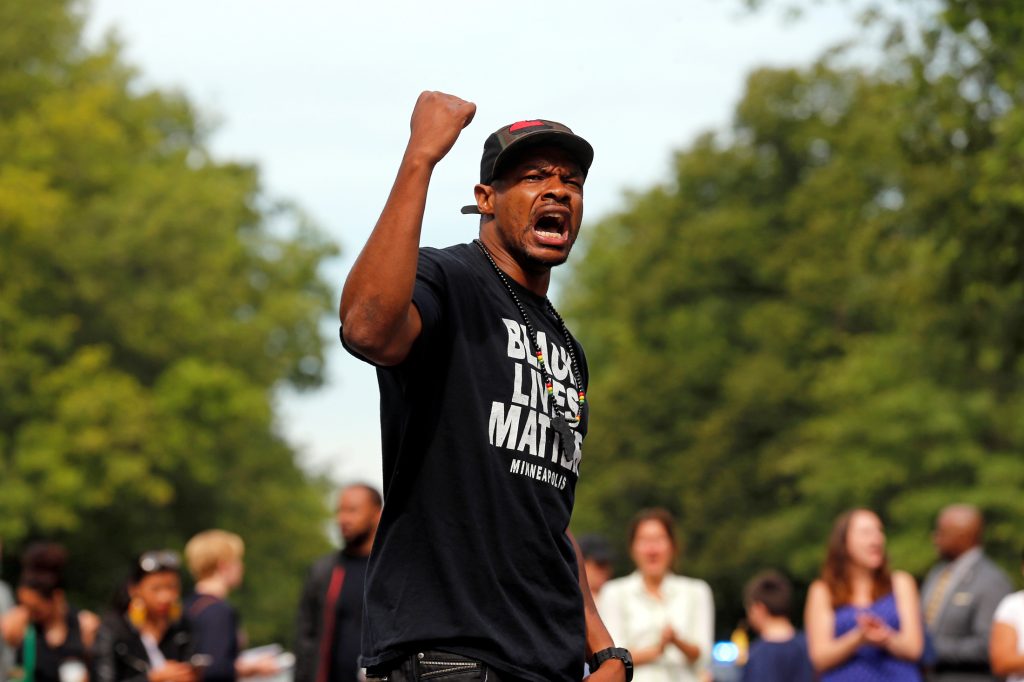 Marques Armstrong chants in support of Philando Castile, who was fatally shot by Minneapolis area police during a traffic stop on Wednesday, at a "Black Lives Matter" demonstration, in front of the Governor's Mansion in St. Paul, Minnesota, U.S., July 7, 2016. Photo By Eric Miller/Reuters