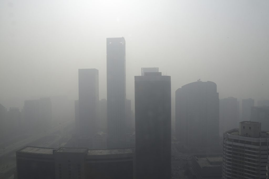 Buildings are seen in heavy haze in Beijing's central business district, January 14, 2013. Photo by Jason Lee/REUTERS