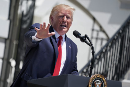 Donald Trump takes questions from reporters during his 'Made In America' product showcase, one day after Tweeting that four Democratic congresswomen of color should “go back” to their own countries. Photo by Chip Somodevilla/Getty Images