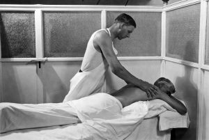 A patient receiving a Swedish massage at the Kellogg's Battle Creek Sanitarium, Battle Creek, Michigan, 1930. Photo by Underwood Archives/Getty Images