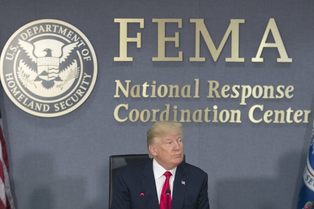 WASHINGTON, DC - AUGUST 4: (AFP OUT) U.S. President Donald Trump speaks during a visit to Federal Emergency Management Age...