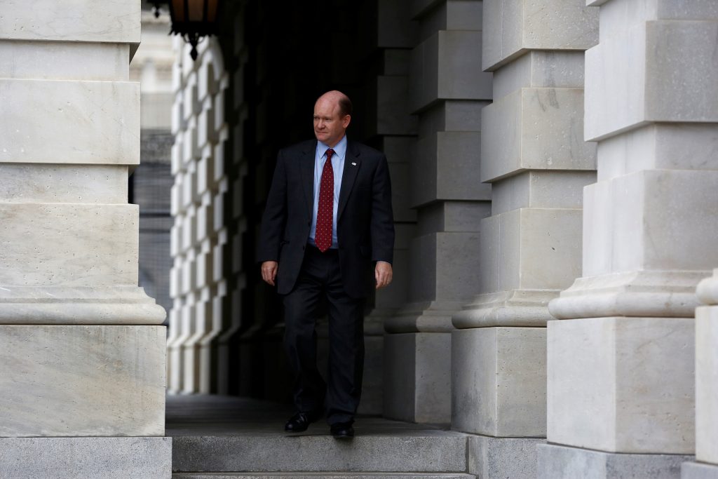 U.S. Senator Chris Coons (D-DE) departs from the Capitol Building for a briefing on North Korea at the White House, in Was...
