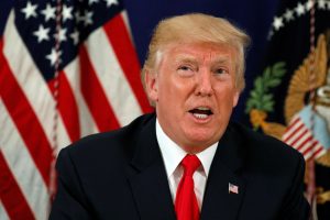 Trump speaks to reporters after a security briefing at his golf estate in Bedminster, New Jersey