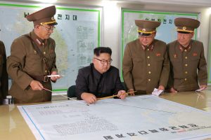 North Korean leader Kim Jong Un visits the Command of the Strategic Force of the Korean People's Army (KPA) in an unknown location in North Korea in this undated photo released by North Korea's Korean Central News Agency (KCNA) on August 15, 2017. KCNA/via REUTERS ATTENTION EDITORS - THIS PICTURE WAS PROVIDED BY A THIRD PARTY. NO THIRD PARTY SALES. SOUTH KOREA OUT. NO COMMERCIAL OR EDITORIAL SALES IN SOUTH KOREA. PICTURE BLURRED AT SOURCE. TPX IMAGES OF THE DAY - RTS1BTNV