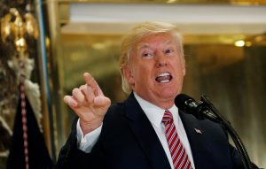President Donald Trump answers questions about his responses to the violence, injuries and deaths at the "Unite the Right" rally in Charlottesville as he talks to the media in the lobby of Trump Tower in Manhattan, New York. Photo by Kevin Lamarque/Reuters