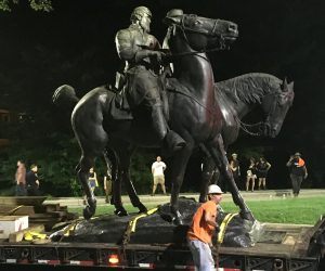 Workers remove the monuments to Robert E. Lee, commander of the pro-slavery Confederate army in the American Civil War, and Thomas "Stonewall" Jackson, a Confederate general, from Wyman Park in Baltimore, Maryland, U.S. August 16, 2017. Courtesy of Alec MacGillis/ProPublica via REUTERS . MANDATORY CREDIT. ATTENTION EDITORS - THIS IMAGE WAS PROVIDED BY A THIRD PARTY. NO SALES. NO ARCHIVES. THIS PICTURE WAS PROCESSED BY REUTERS TO ENHANCE QUALITY. AN UNPROCESSED VERSION HAS BEEN PROVIDED SEPARATELY TPX IMAGES OF THE DAY - RTS1C3NK