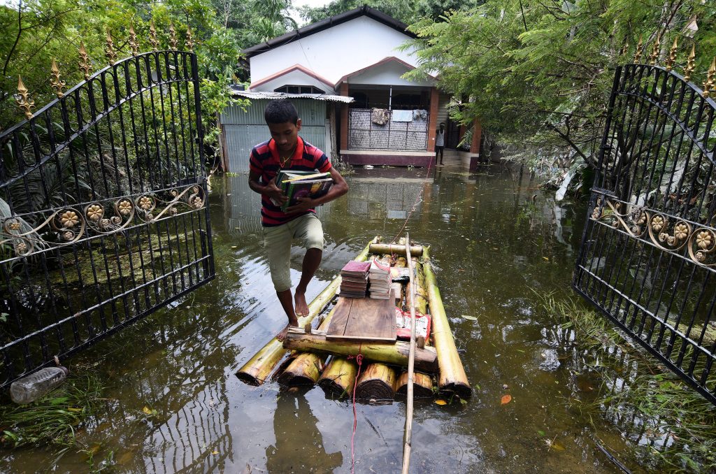 The United Nations estimates that 41 million people are affected by the flooding and landslides in South Asia. Photo by An...