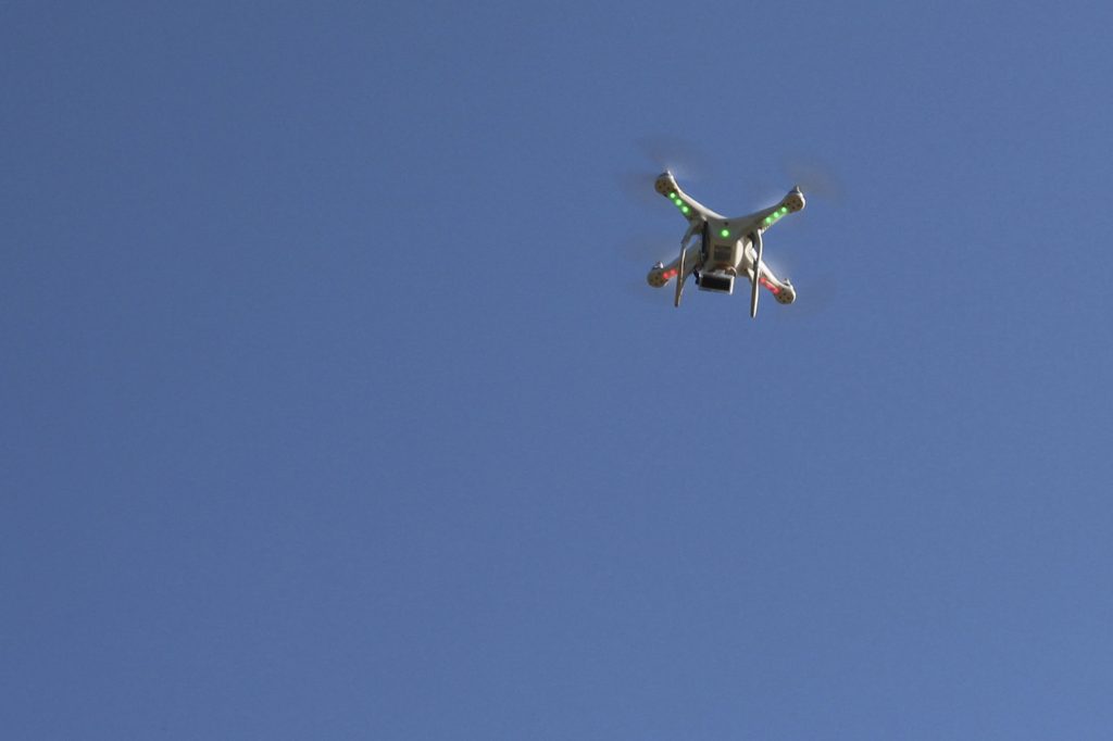 Free Syrian Army fighters fly a remote-controlled miniature aircraft with a camera attached -- a device the fighters say i...
