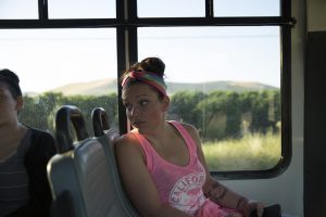 Heather Menzel rides the 6 a.m. bus to Bakersfield, California, en route to a methadone clinic on June 6, 2016. Photo by Brian Rinker for Kaiser Health News