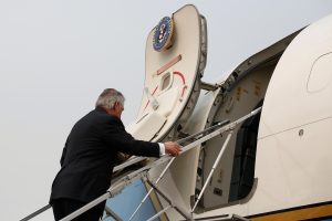 U.S. State of Secretary Rex Tillerson boards a plane at the airport in Beijing