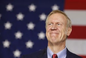 Illinois governor signs law limiting police cooperation with federal immigration officials