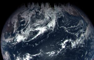 An image of Earth taken by the OSIRIS-REx MapCam on Sept. 22. The view shows the Pacific Ocean, with Australia in the lower left and Baja California and the southwestern U.S. in the upper right. The dark streaks at the top are due to short photo exposure times, which are need to capture an object as bright as Earth. Photo by NASA's Goddard Space Flight Center/University of Arizona