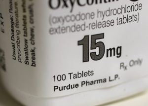 A bottle of Purdue Pharma L.P. OxyContin medication sits on a pharmacy shelf in Provo, Utah. Photo by George Frey/Bloomberg via Getty Images