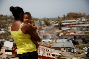 A woman observes the destruction of Hurricane Maria in Canovanas, Puerto Rico, on Sept. 26. Photo by Carlos Garcia Rawlins/Reuters