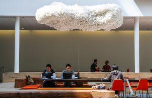 People worked in the lobby of the Airbnb office headquarters in the SOMA district of San Francisco, California, U.S., August 2, 2016. REUTERS/Gabrielle Lurie - RC185895A7E0