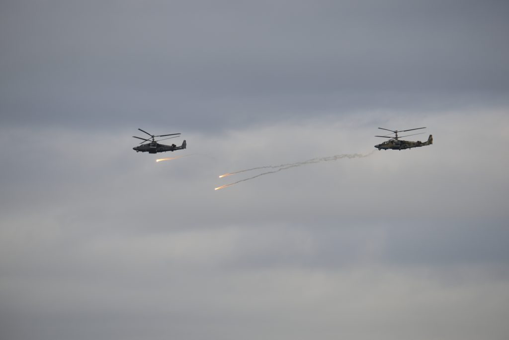Helicopters take part in Zapad-2017 war games, held by Russia and Belarus, at an undisclosed location in Belarus on Sept. ...