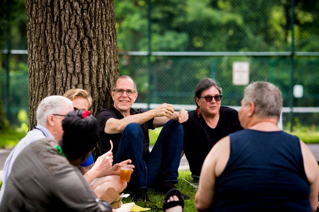 Eric Bates talks with other alumni between sessions at the Antioch College reunion weekend in Yellow Springs, Ohio Saturda...