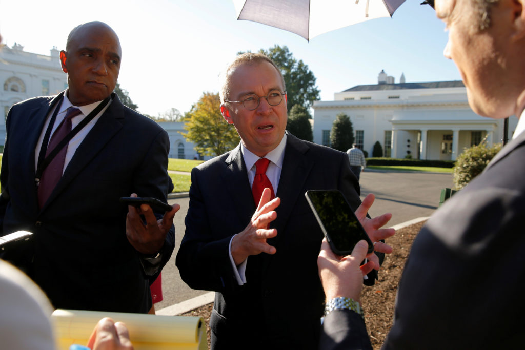 White House Office of Management and Budget (OMB) Director Mick Mulvaney speaks to reporters outside the White House on Oc...