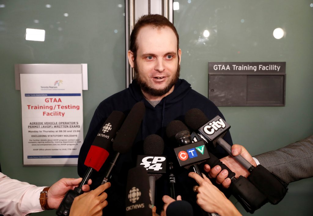 Boyle speaks to the media after arriving at Toronto Pearson International Airport, nearly 5 years after he and his wife we...