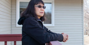 “I miss being whole,” says Patricia Martin of her husband, Bob. A family practice physician, Dr. Robert Martin died of prostate cancer in 2014 in the family’s Wasilla, Alaska, home. (Heidi de Marco/KHN)