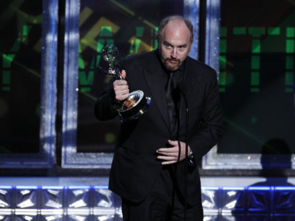 Louis C.K. accepts the award for outstanding writing for a variety special for "Louis C.K. Live at the beacon Theatre" at the 64th Primetime Emmy Awards in Los Angeles, September 23, 2012. REUTERS/Lucy Nicholson