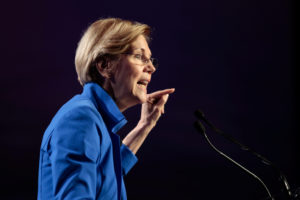 Senator Elizabeth Warren (D-MA) addresses the audience at the morning plenary session at the Netroots Nation conference for political progressives in Atlanta, Georgia, U.S. August 12, 2017. REUTERS/Christopher Aluka Berry - RC19284659C0