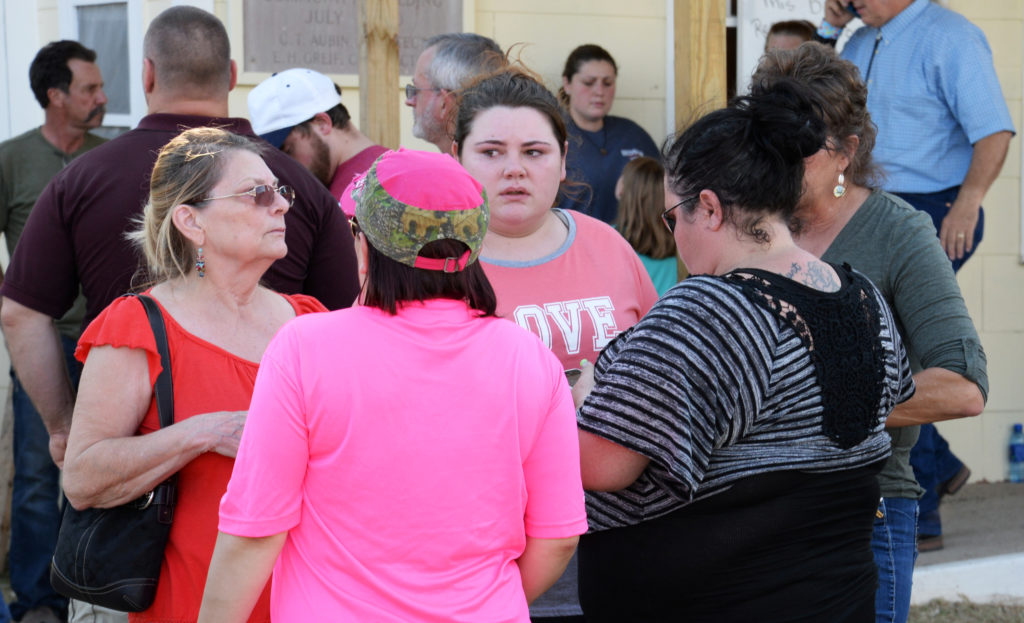 Families gather at the community center awaiting news about the First Baptist Church shooting in Sutherland Springs, Texas...