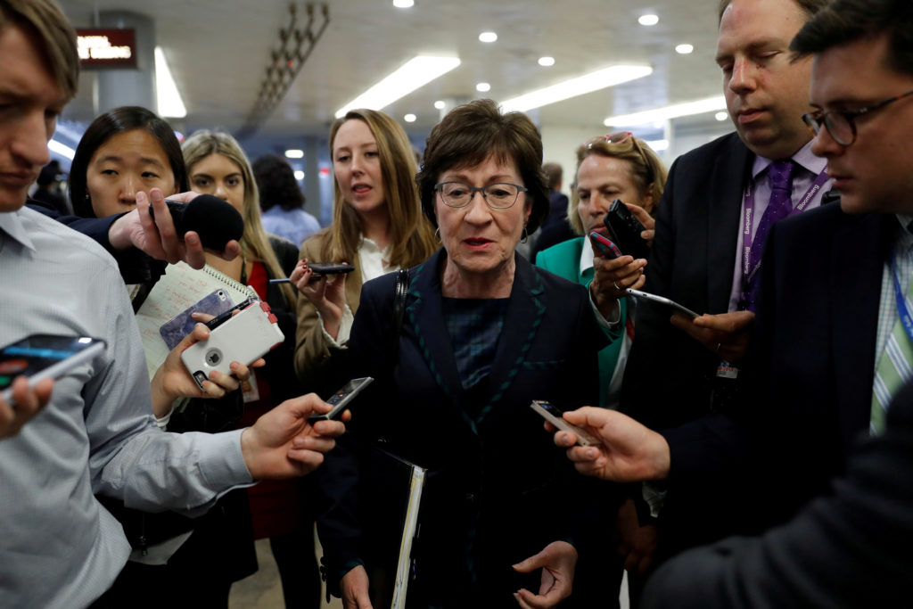 FILE PHOTO: Sen. Susan Collins (R-ME) speaks with reporters ahead of the party luncheons on Capitol Hill in Washington, U....