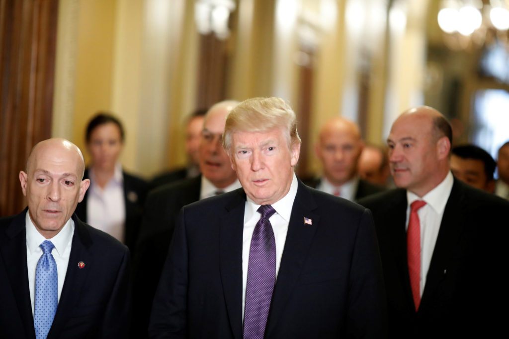 U.S. President Donald Trump arrives with Director of the National Economic Council Gary Cohn at the U.S. Capitol to meet w...