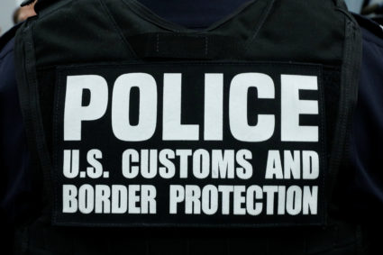 A U.S. Customs and Border Protection officer attends a speech by U.S. Attorney General Jeff Sessions about the Trump Administration efforts to combat the opioid crisis at John F. Kennedy International Airport in New York