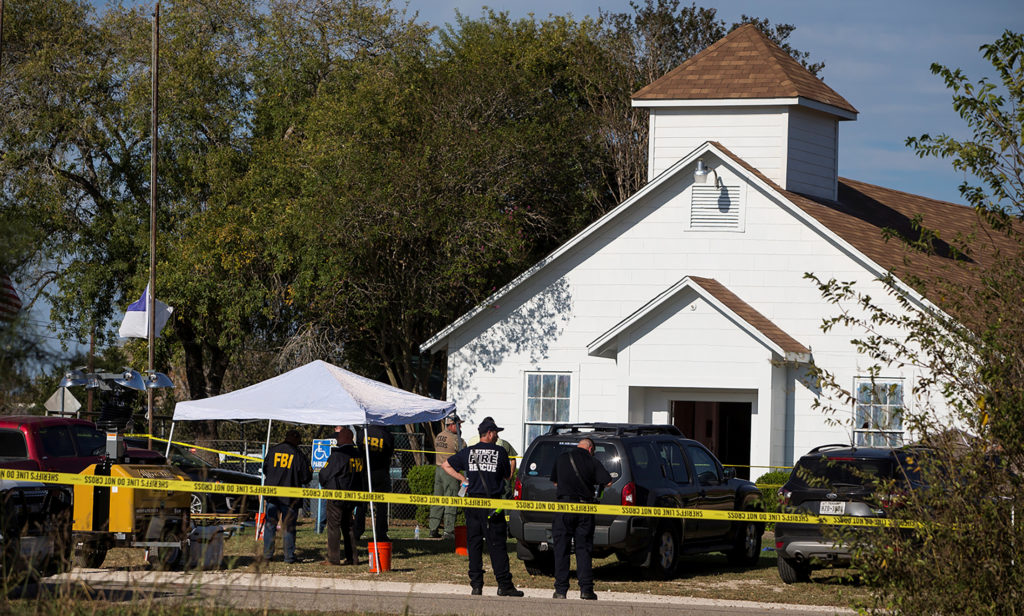 Law enforcement officials investigate a mass shooting at the First Baptist Church in Sutherland Springs, Texas, U.S. Novem...