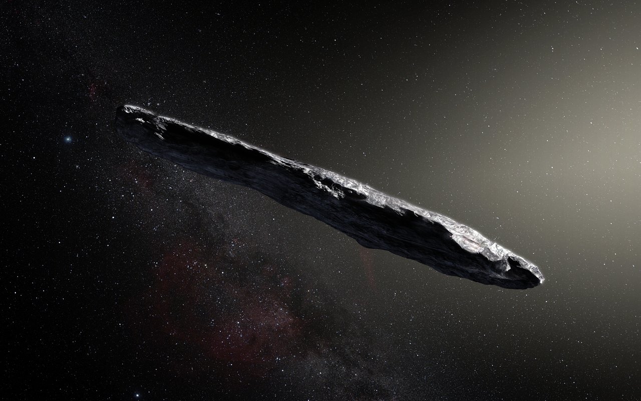 This artist’s impression shows the first interstellar asteroid: `Oumuamua. Photo by M. Kornmesser