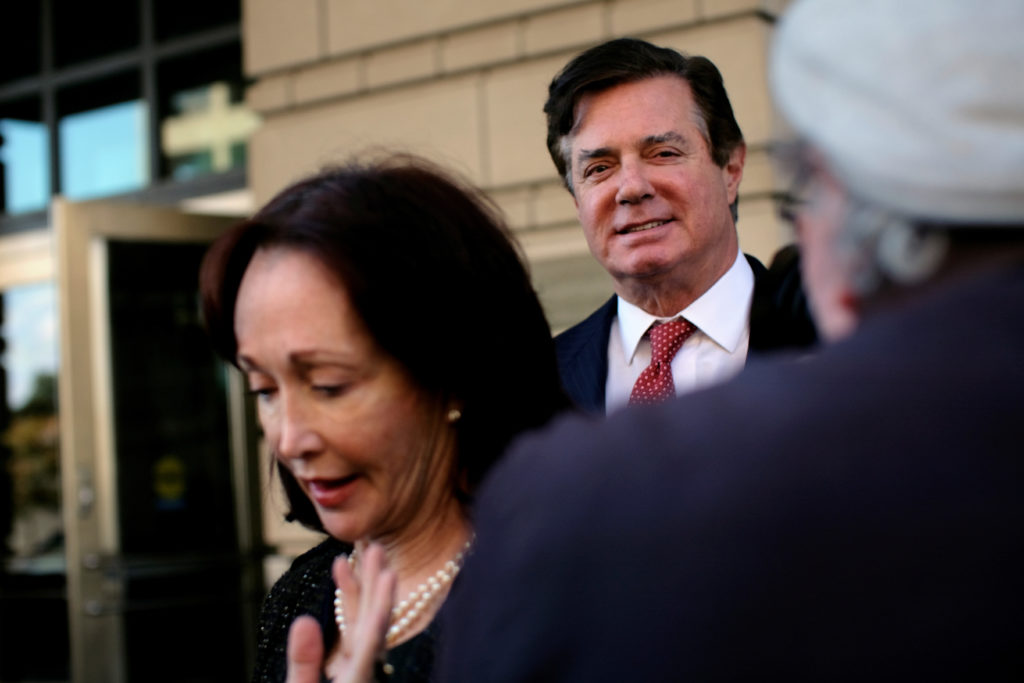 Paul Manafort, former U.S. President Donald Trump 2016 campaign chair (R), departs after a status conference at the U.S. D...